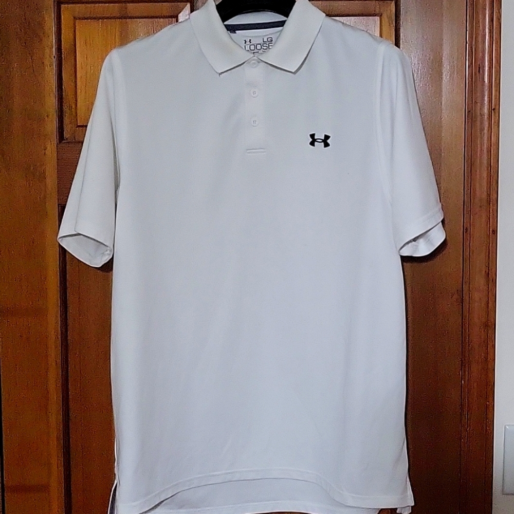 White Under Armor golf shirt.